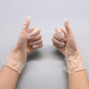 Guante de vinilo transparente sin polvo o en polvo de PVC médico desechable 