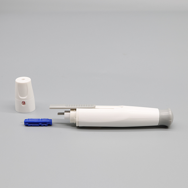 Dispositivo de punción eyectable para pruebas de diabetes
