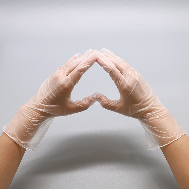 Guante de vinilo transparente sin polvo o en polvo de PVC médico desechable 